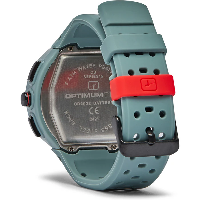 Rear view of the grey Optimum Time Series 15 sailing watch, showing the metal case back, black buckle and red strap keeper.