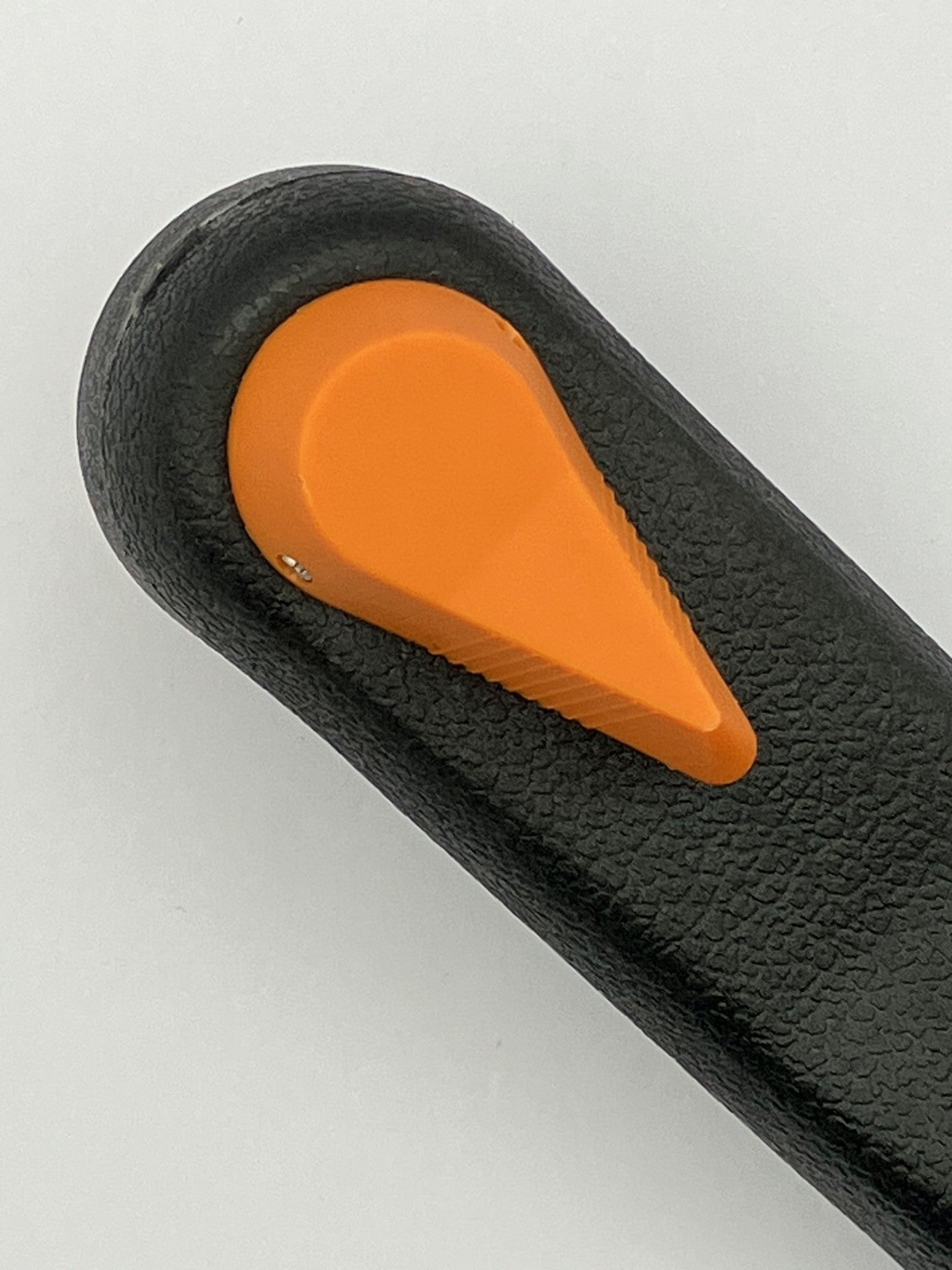 Angled view of floating locking winch handle lock