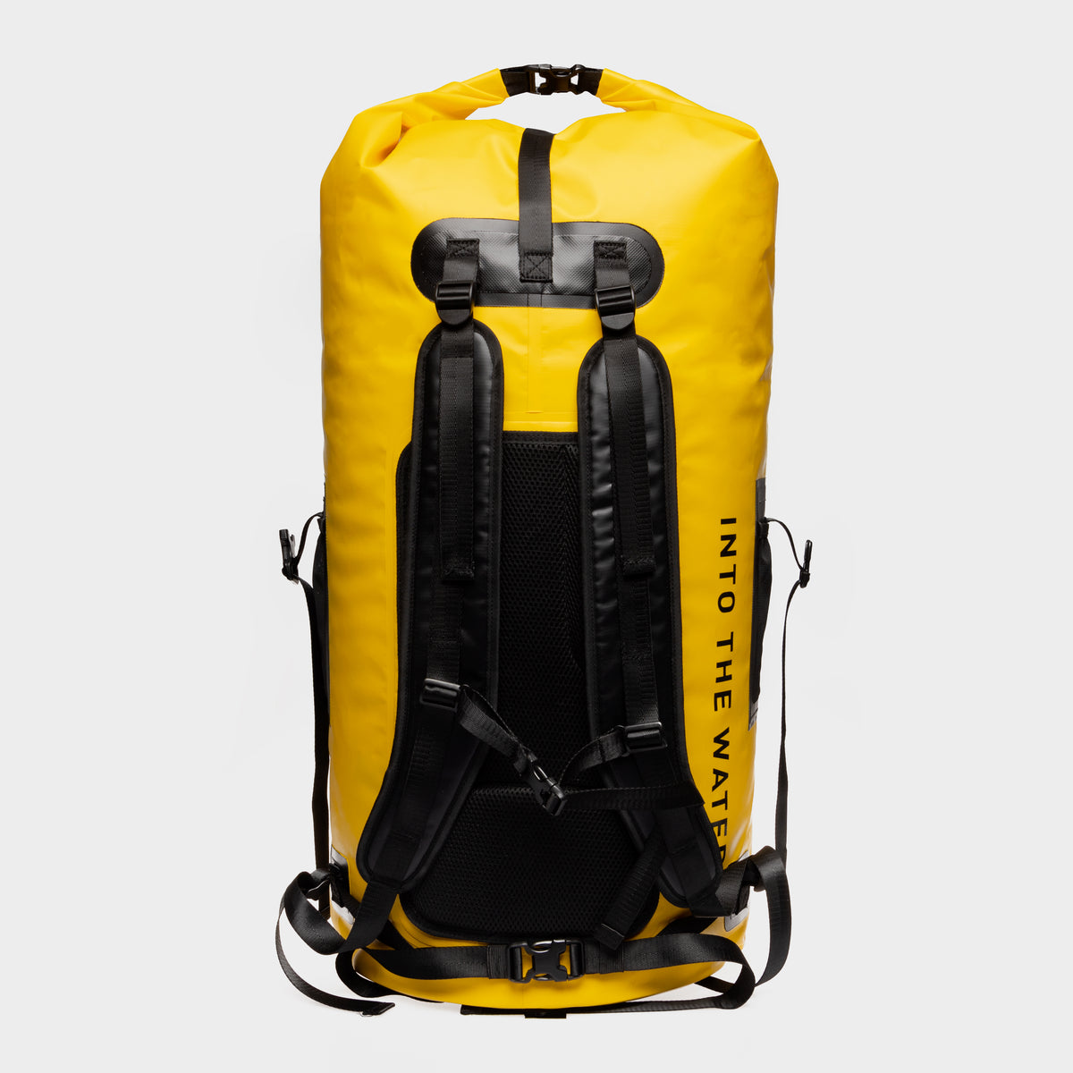 Rear view of the yellow GUL Drypac 100L dry bag showing backpack straps and waist belt