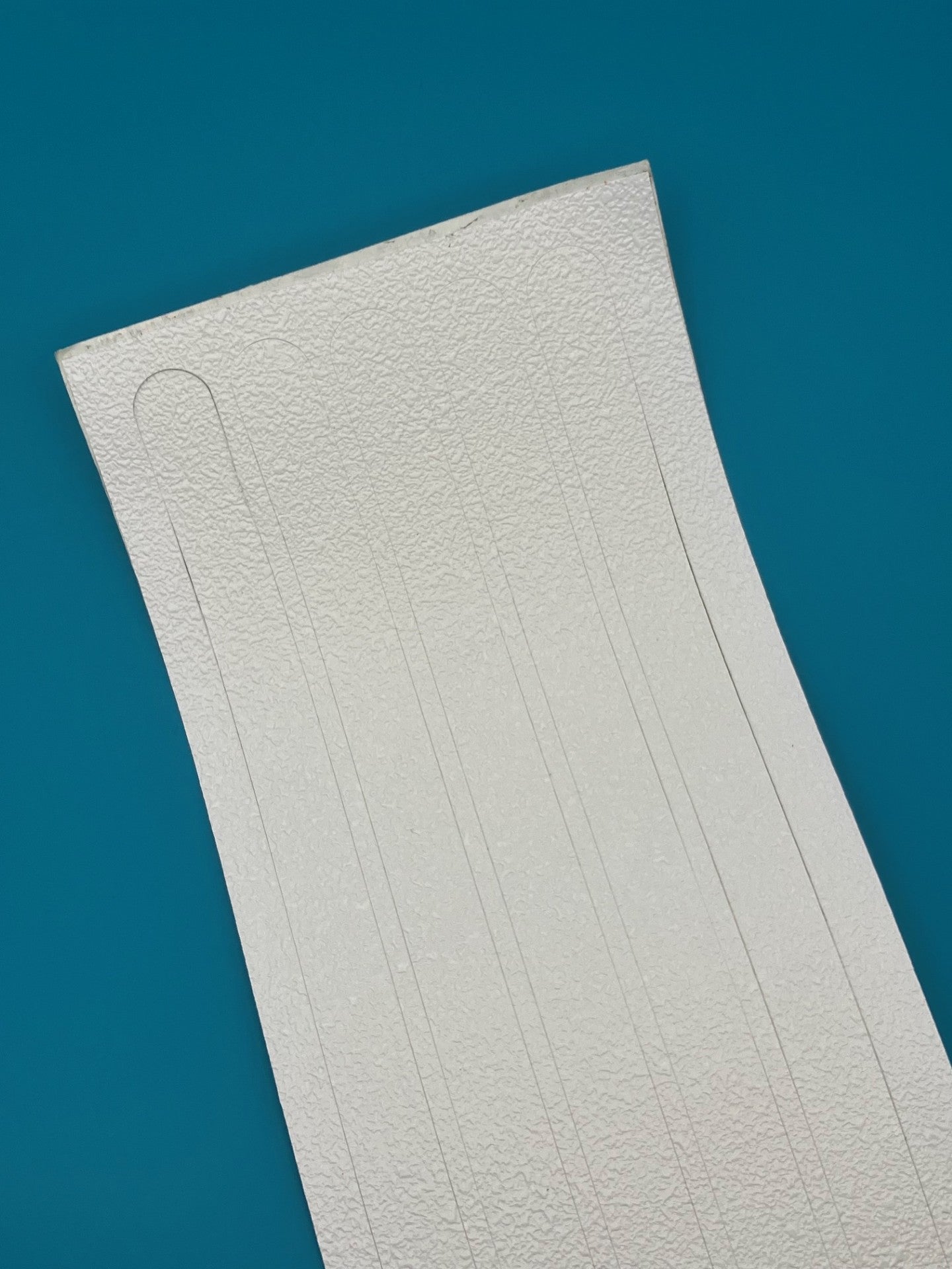 Close up of non slip safety tread strips 19mm x 300mm with rounded corners