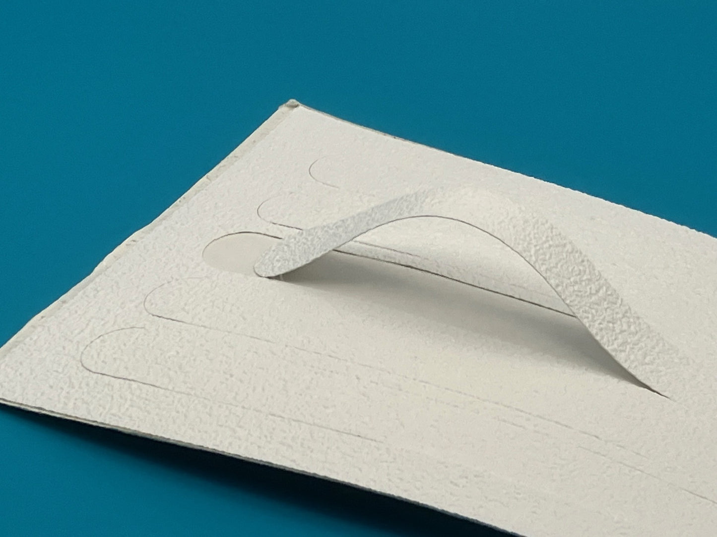 Non slip strips applied to boat deck surface showing installation