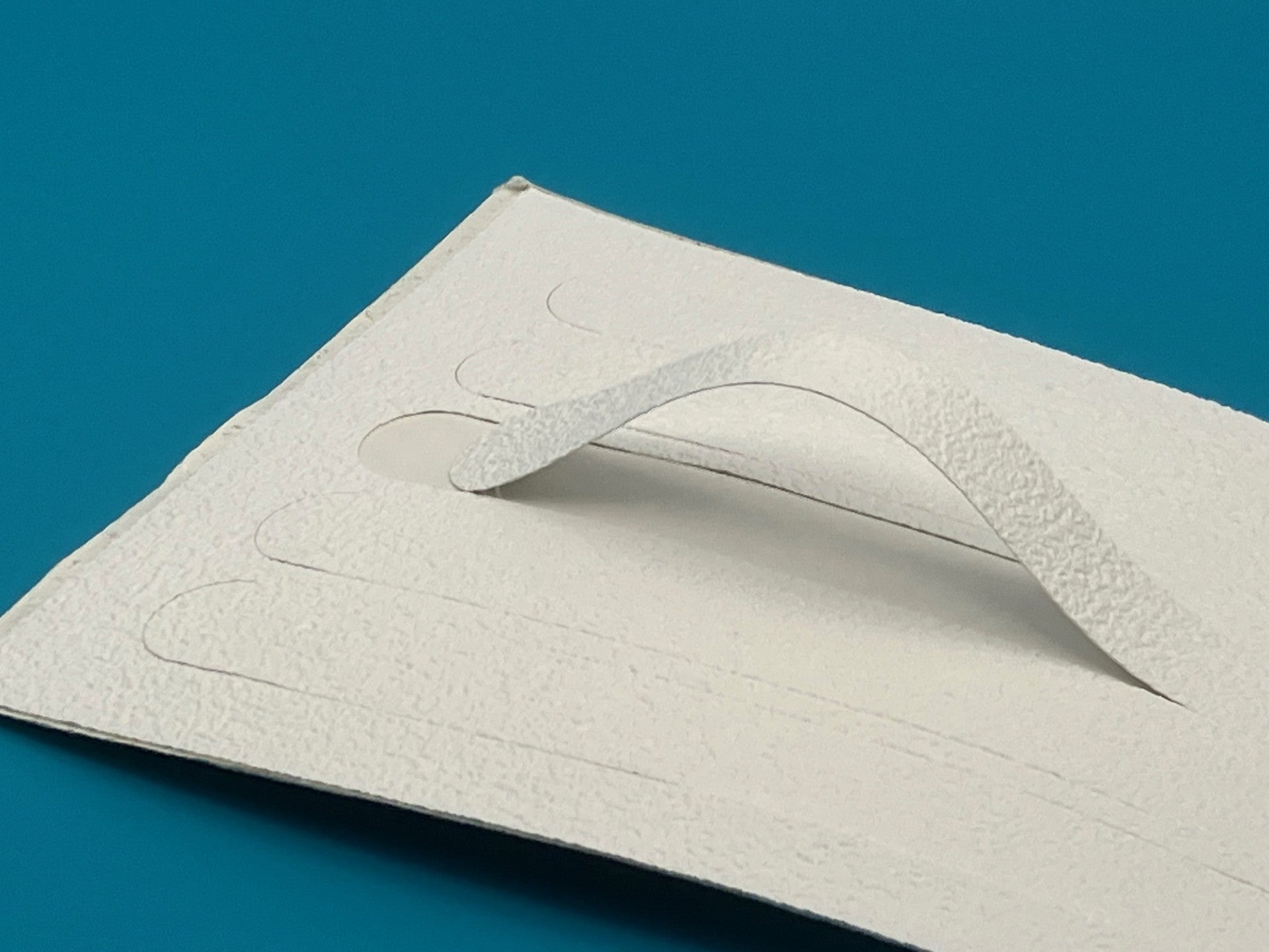 Non slip strips applied to boat deck surface showing installation