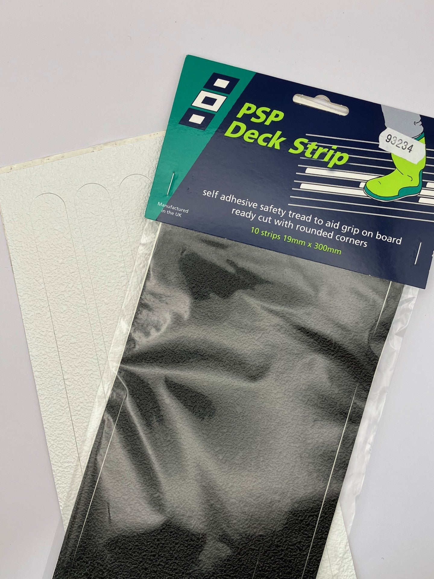 Self adhesive backing on non slip deck strips for easy application