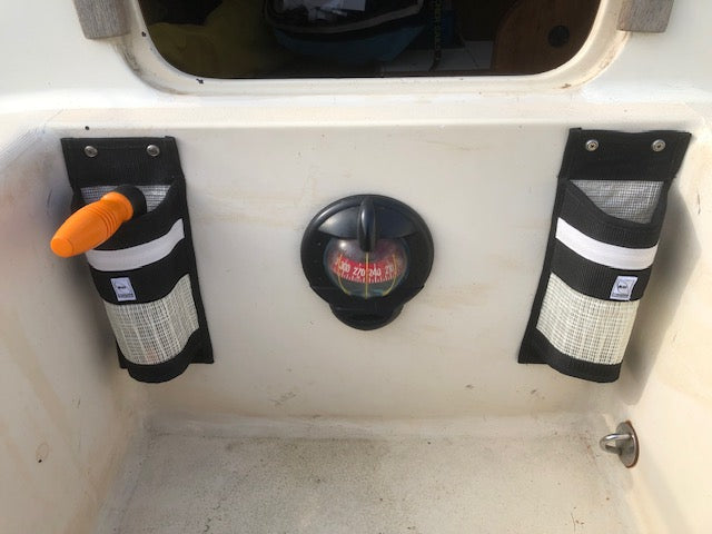 Recycled sail winch handle pocket mounted on boat showing installation