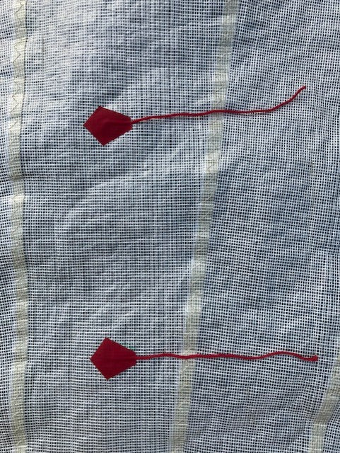 Detail of Merino wool tell tales with waterproof coating