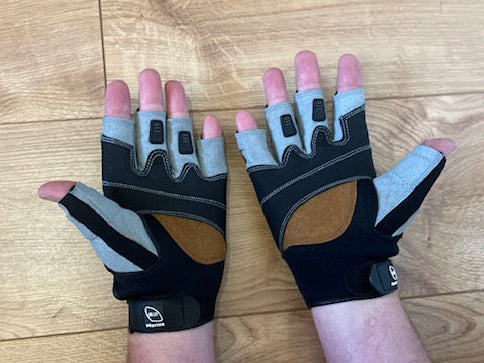 Sailing gloves in action providing grip and protection during line handling