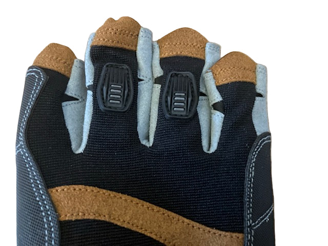 Close-up of armoured knuckle protection pads on sailing gloves