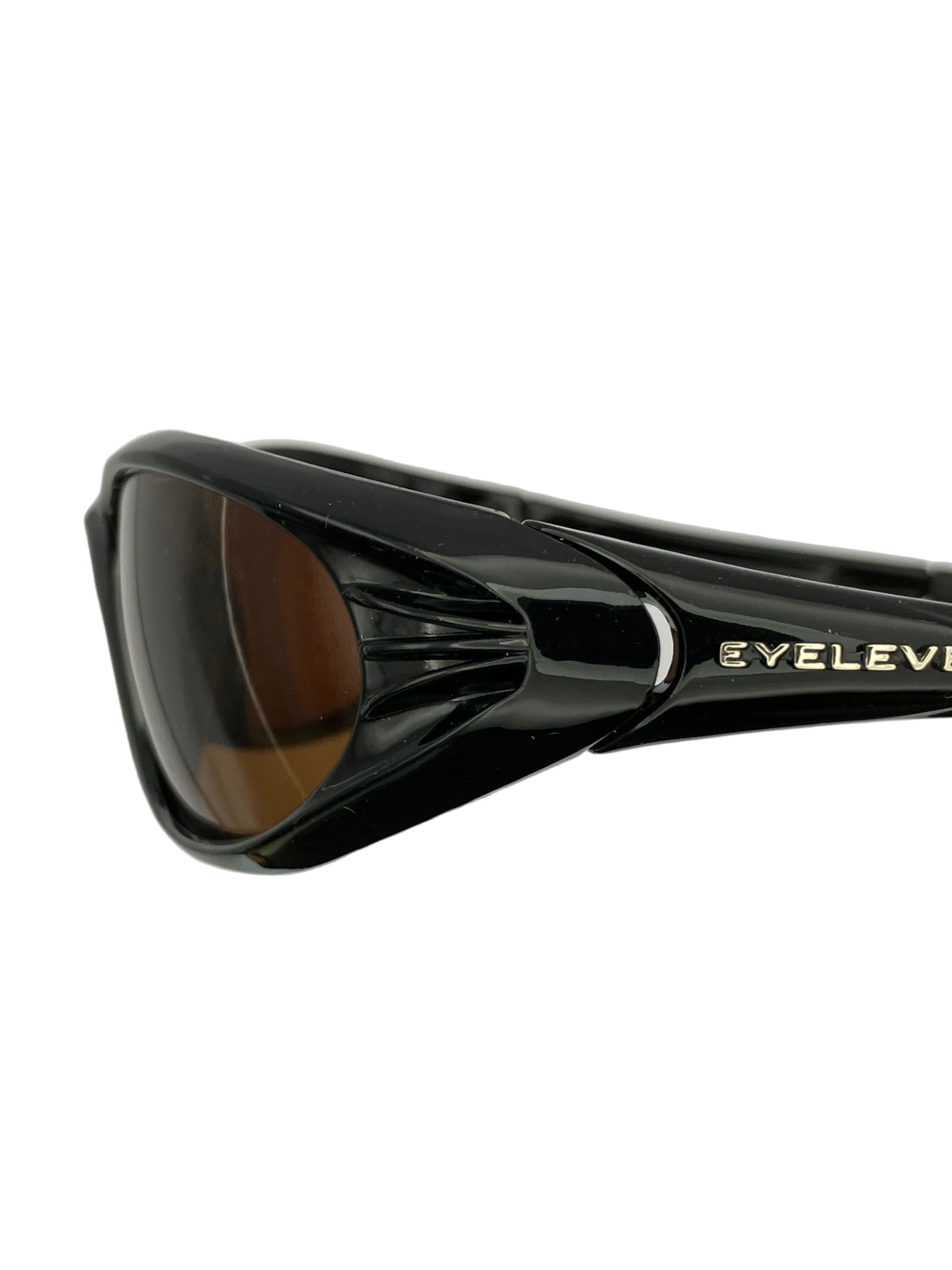 Wrap-around sailing sunglasses side profile showing secure fit