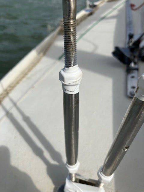 Self amalgamating tape wrapped around bottle screw