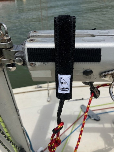 Velcro pull handle installed on boat keeping rope end tidy